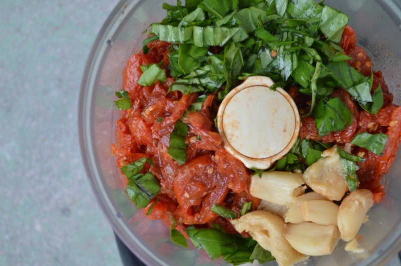 Sprouts and Chocolate: Slow Roasted Tomato and Garlic Pasta Sauce. Slow roasting tomatoes brings out their natural sweetness and when made into a sauce, it is a heavenly combination. Takes a little while but it is entirely worth the effort. You may find yourself just eating them straight off the pan.