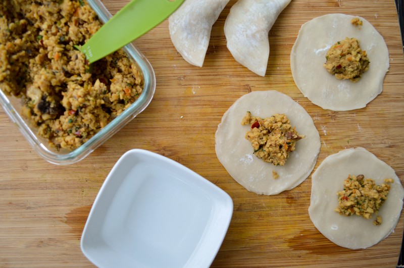 Sprouts & Chocolate: Steamed Miso-Mushroom & Tempeh Dumplings with Red Chilli Peanut Oil. 