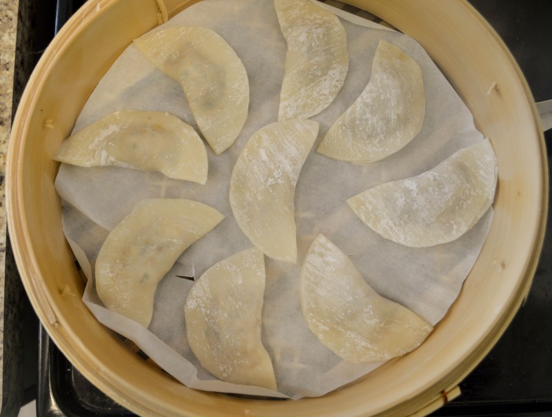 Sprouts & Chocolate: Steamed Miso-Mushroom & Tempeh Dumplings with Red Chilli Peanut Oil. 