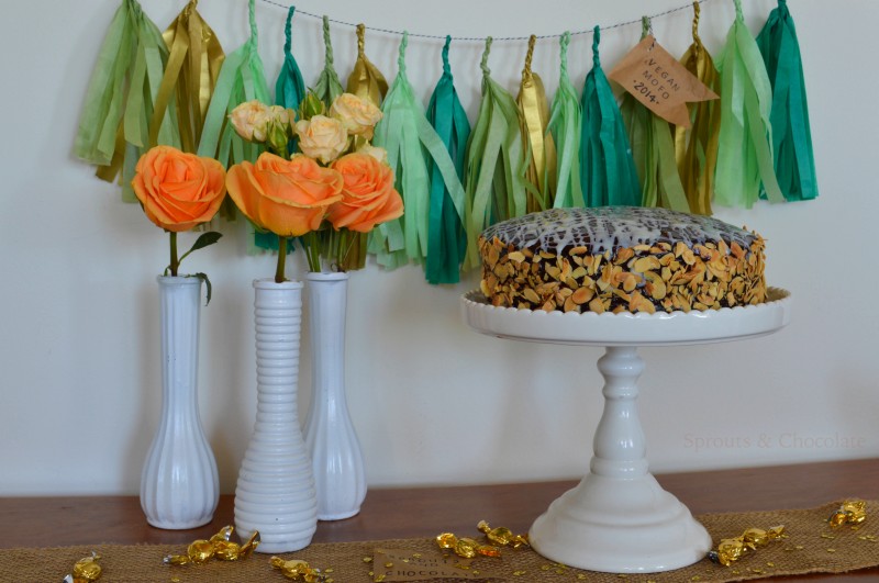 Sprouts & Chocolate: Decadent Chocolate Cake with Chocolate Ganache. This rich cake is so heavenly and you wouldn't believe it to be vegan! Served with chocolate ganache and toasted almond edges, this chocolate cake is a vegan and chocolate lovers delight.