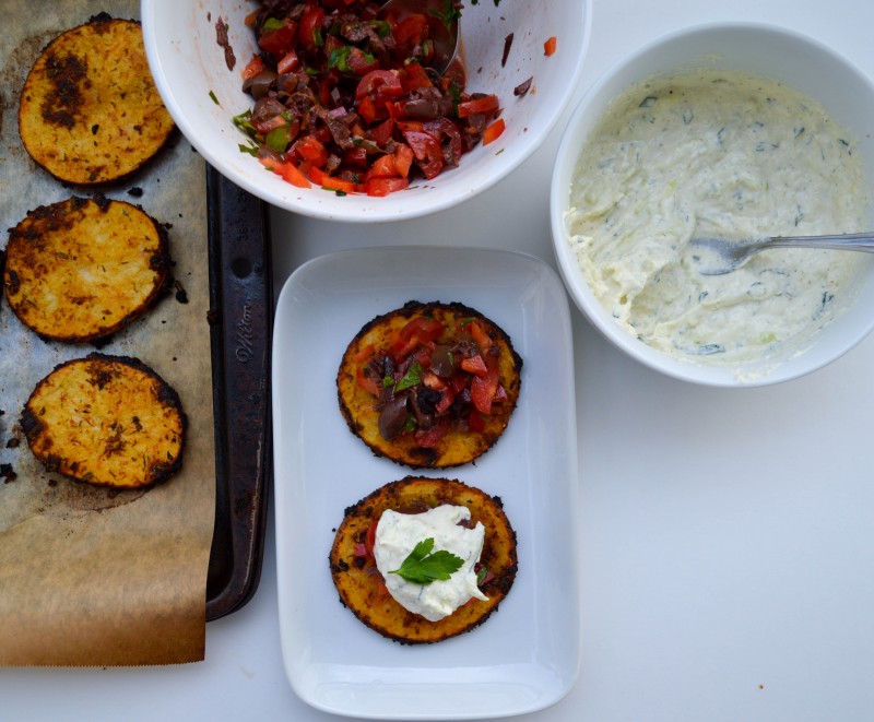 Sprouts & Chocolate: Roasted Greek Potato Rounds with Olive-Tomato Salsa and Cashew Tzatziki Sauce. Great appetizer to share or a main meal with a green salad. This recipe is vegan and gluten free. Cashews make this tzatziki sauce creamy and fresh!