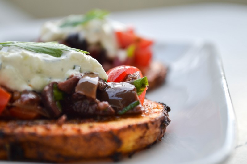 Sprouts & Chocolate: Roasted Greek Potato Rounds with Olive-Tomato Salsa and Cashew Tzatziki Sauce. Great appetizer to share or a main meal with a green salad. This recipe is vegan and gluten free. Cashews make this tzatziki sauce creamy and fresh!