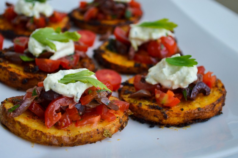 Sprouts & Chocolate: Roasted Greek Potato Rounds with Olive-Tomato Salsa and Cashew Tzatziki Sauce. Great appetizer to share or a main meal with a green salad. This recipe is vegan and gluten free. Cashews make this tzatziki sauce creamy and fresh!